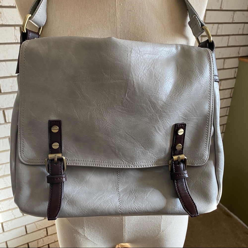 Gray faux leather messenger bag   Brown straps and details.